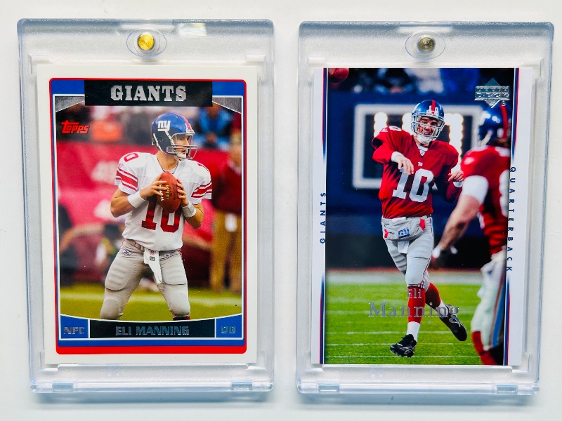 Photo 1 of 195272…2 Eli Manning cards in hard plastic cases 