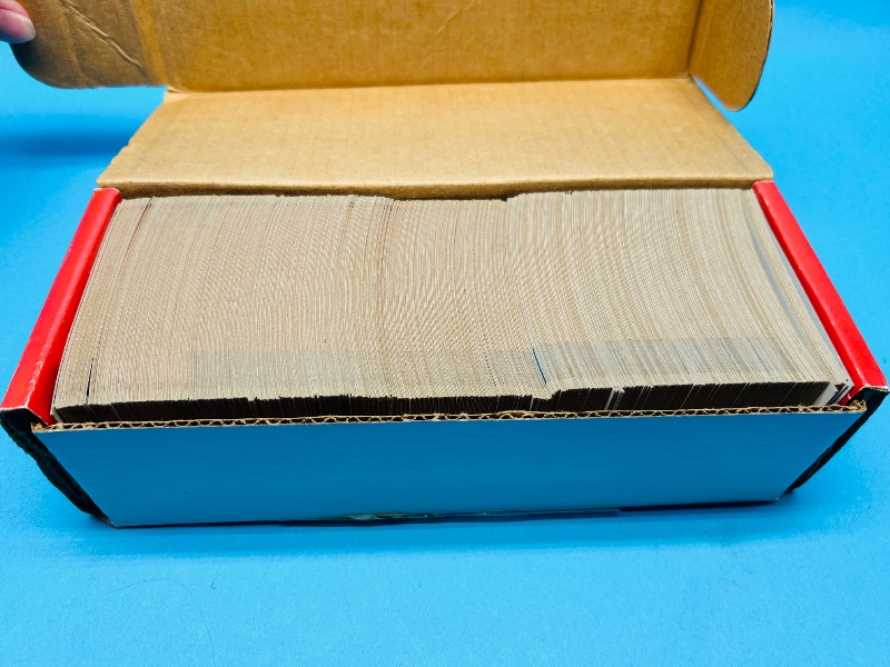 Photo 1 of 195283…Topps 1990 football card set box. Box shows some wear, cards have slight bend