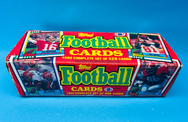 Photo 1 of 195283…Topps 1990 football card set box. Box shows some wear, cards have slight bend