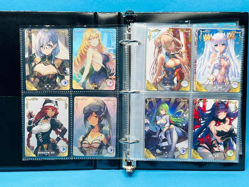 Photo 1 of 195291… final sale no returns/refunds-56 mixed Anime cards in binder -Japan