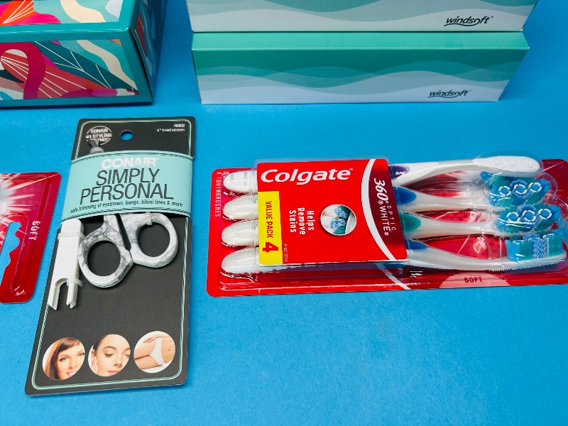 Photo 1 of 195452…Kleenex tissue, Colgate toothbrushes, and trimming scissors 