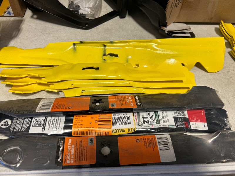 Photo 1 of 195480…final sale-misc tractor parts returns- blades, mulching, cover, accessories no refunds/returns
