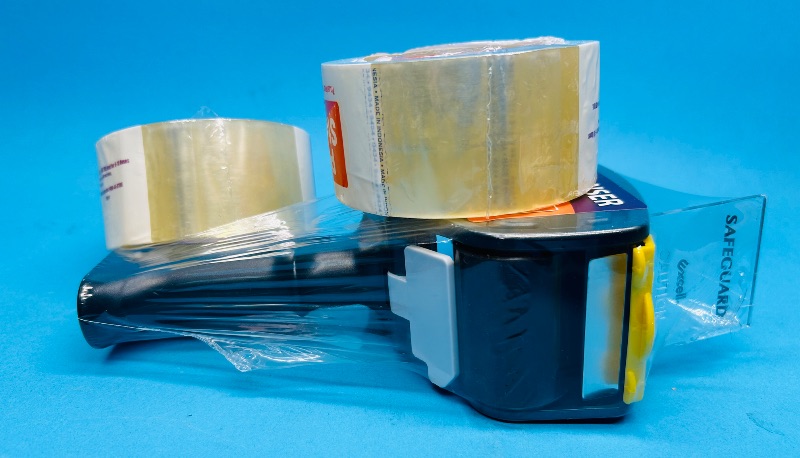 Photo 1 of 195486…2 rolls of packaging tape and tape gun