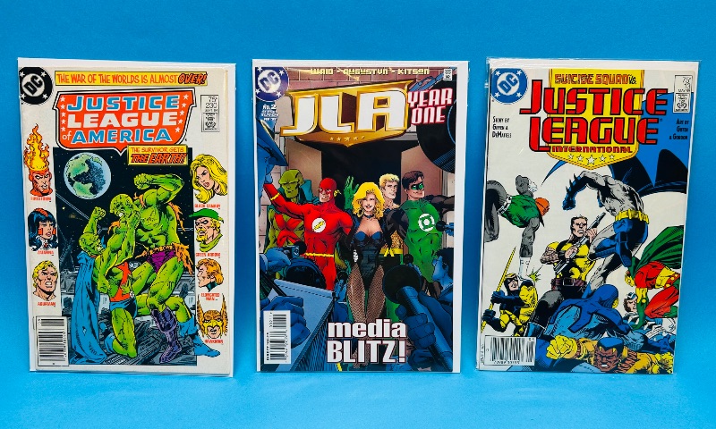 Photo 1 of 195561…3 vintage JLA comics in plastic sleeves 