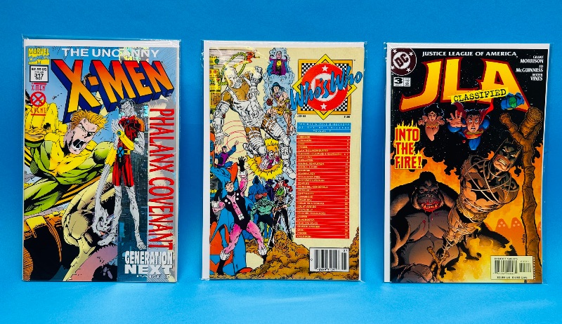 Photo 1 of 195575…3 comics in plastic sleeves 