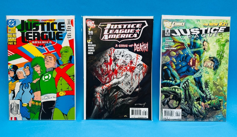 Photo 1 of 195585…3 justice league comics in plastic sleeves 