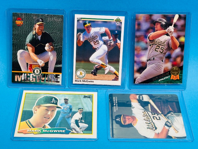 Photo 1 of 195599…5 Mark McGwire cards in hard plastic sleeves 