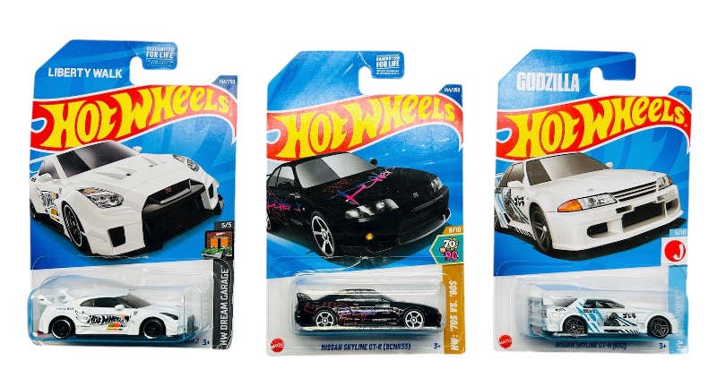 Photo 1 of 195621…3  hot wheels die cast Nissan cars 
