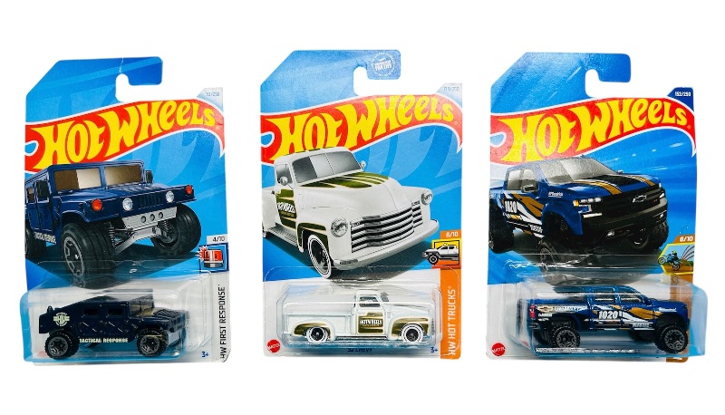 Photo 1 of 195622…3  hot wheels die cast trucks