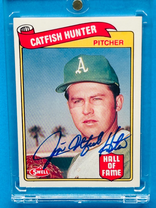 Photo 1 of 195641…autographed  vintage Catfish Hunter card 10  in hard plastic case