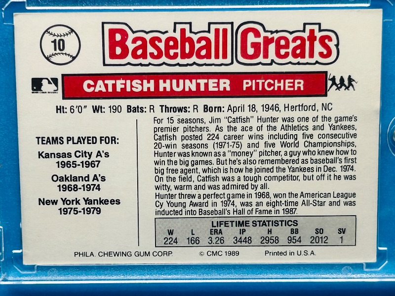 Photo 1 of 195641…autographed  vintage Catfish Hunter card 10  in hard plastic case