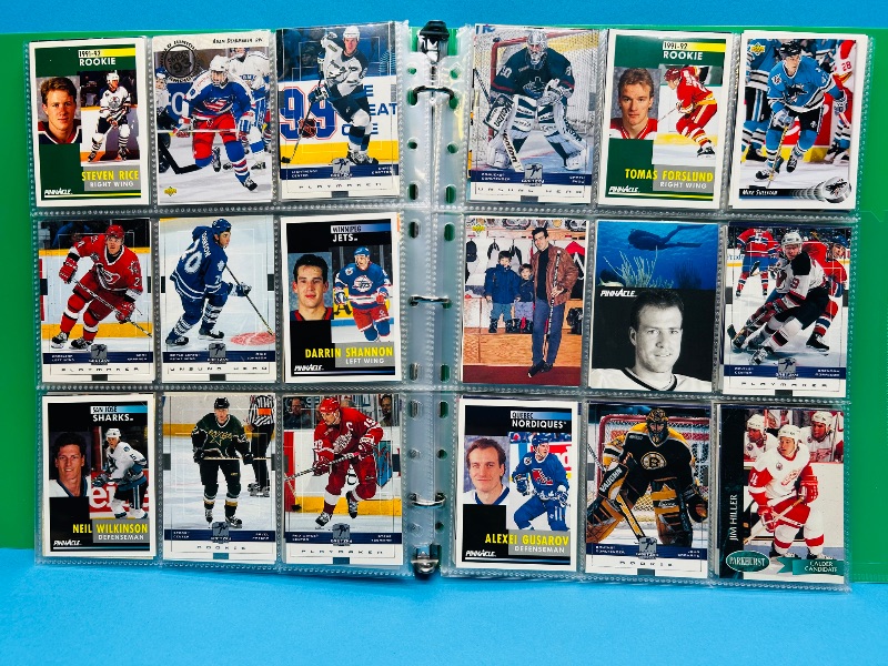 Photo 1 of 195665… final sale no return/ refund-270 mixed hockey cards in binder