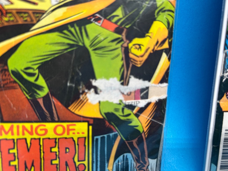 Photo 1 of 195681…damaged vintage Spider-Man comics with rips, bends, etc.