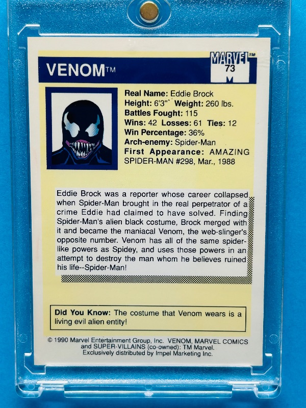 Photo 1 of 195690…vintage Marvel Venom card 73 in hard plastic case