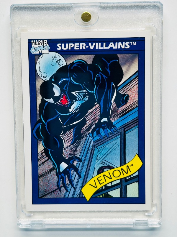 Photo 1 of 195690…vintage Marvel Venom card 73 in hard plastic case