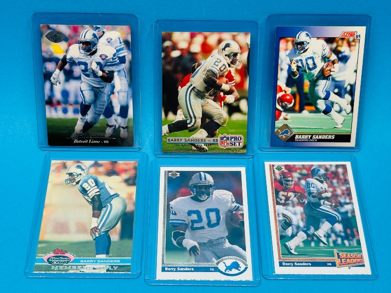 Photo 1 of 195737…6 Barry Sanders cards in hard plastic sleeves