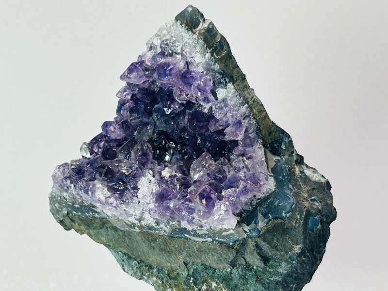 Photo 1 of 195785…5.5” amethyst rock on display stand-height includes stand