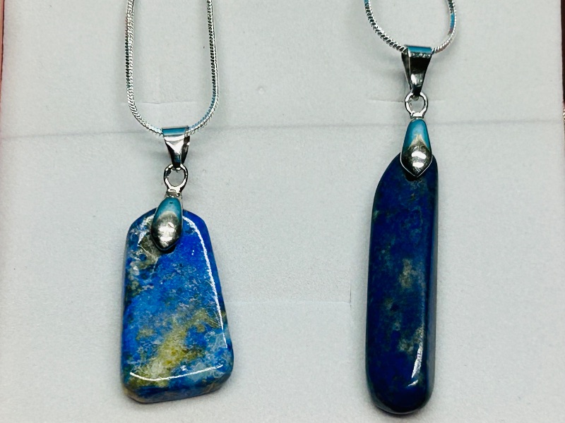 Photo 1 of 195815…2 polished rock pendants on 18” chains in gift box