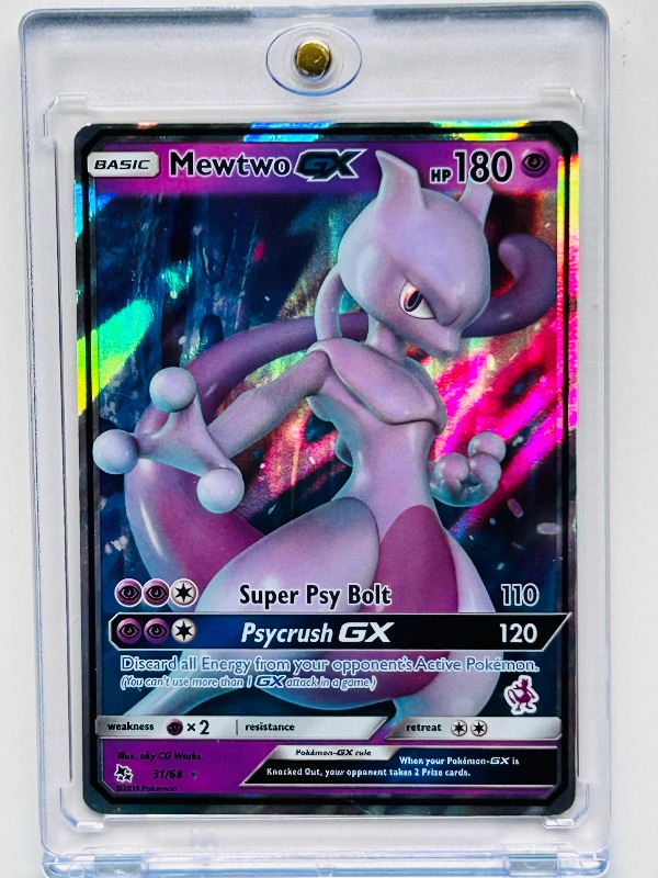 Photo 1 of 195858…Holo Mewtwo GX Pokémon card in hard plastic case