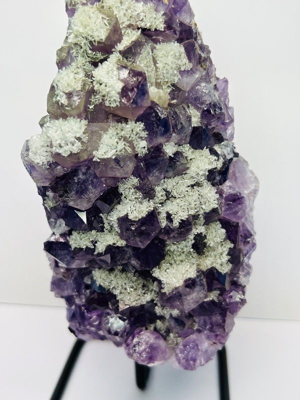 Photo 1 of 195875…7.5” amethyst crystal rock on stand- height includes stand