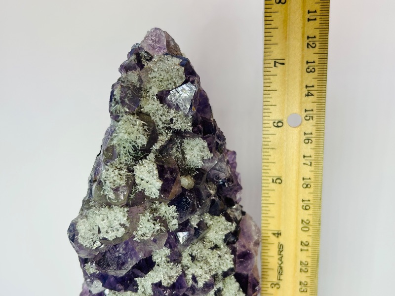 Photo 1 of 195875…7.5” amethyst crystal rock on stand- height includes stand