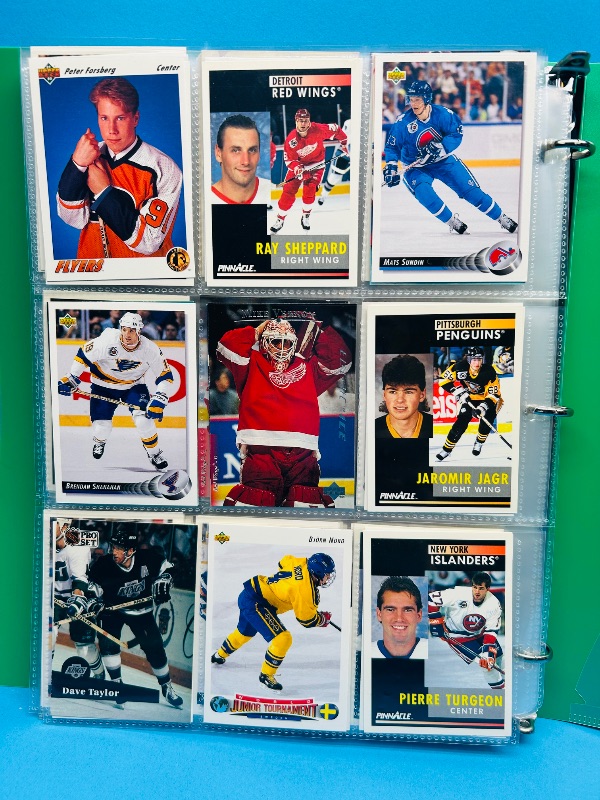 Photo 1 of 195880…final sale no return/refund-270 mixed hockey cards in binder