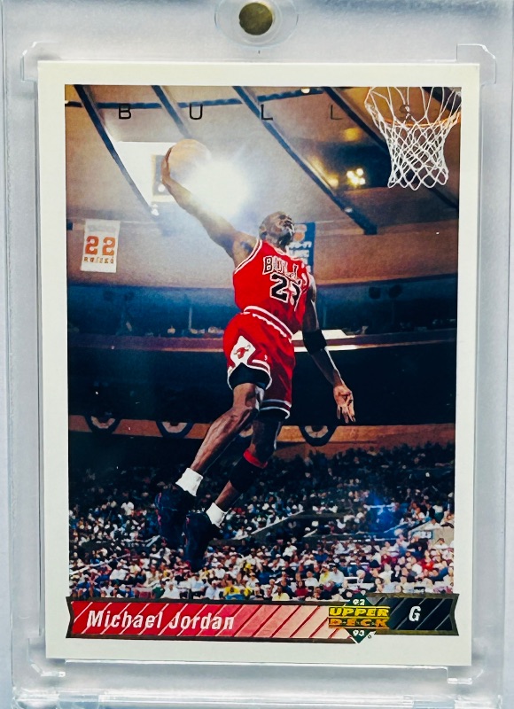View 1 of 195893…Michael Jordan Upper Deck card 23 in hard plastic case