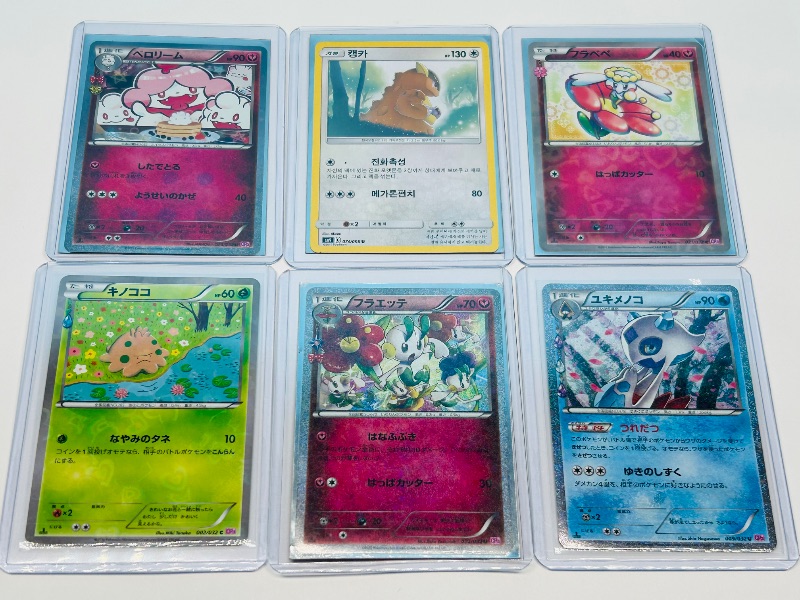Photo 1 of 195936…Asian reverse holo Pokemon cards in hard plastic sleeves 