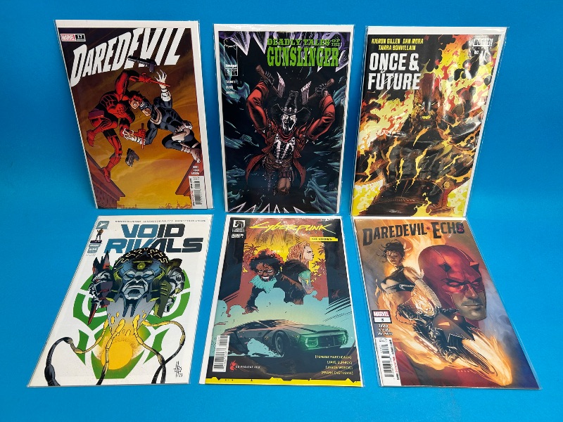 Photo 1 of 195967…6  comics in plastic sleeves 