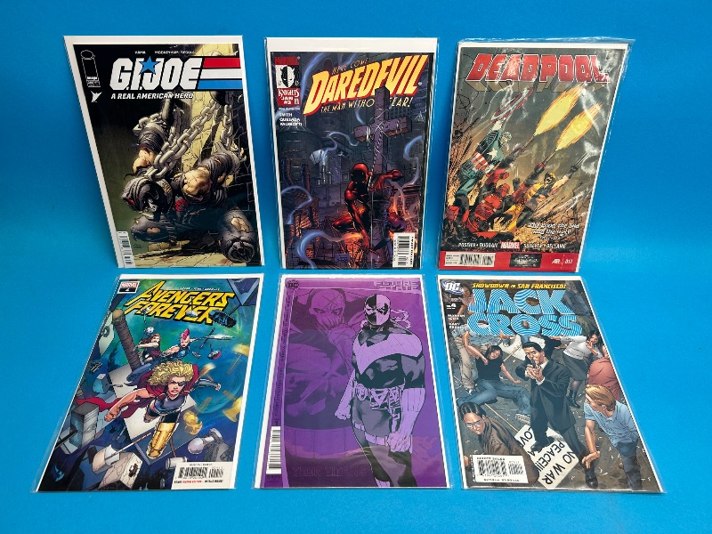 Photo 1 of 195968…6  comics in plastic sleeves 