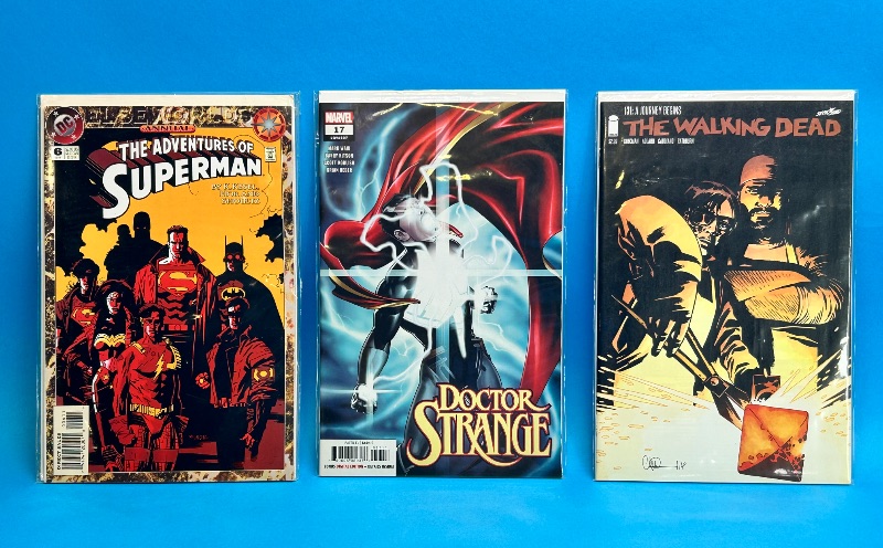 Photo 1 of 195970…3  comics in plastic sleeves 