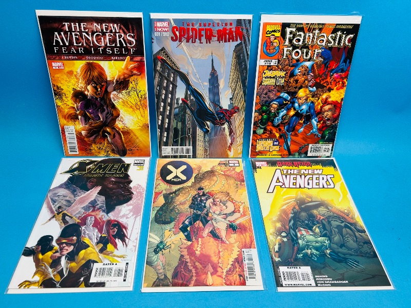 Photo 1 of 196155…6  comics in plastic sleeves 