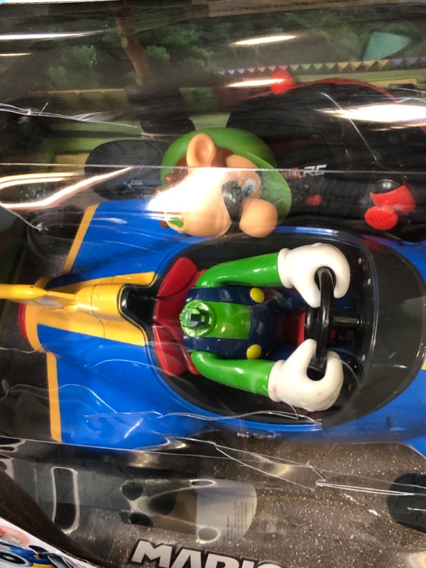 Photo 1 of Carrera RC Official Licensed Mario Kart Mach 8 Luigi 1: 18 Scale 2.4 Ghz Remote Radio Control Car with Rechargeable Lifepo4 Battery - Kids Toys Boys/Girls, (Model: 181067)