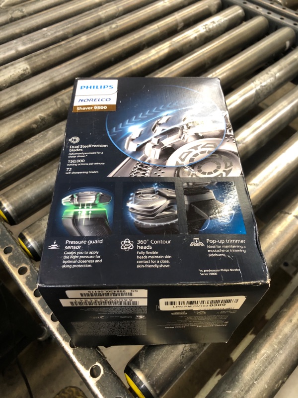 Photo 1 of Philips Norelco Shaver Series 9000, Wet and Dry Electric Shaver, with Lift & Cut Shaving System and SenseIQ Technology, Pop-up Trimmer, Cleaning Pod and Travel Case, Chrome Silver, Model S9985/84