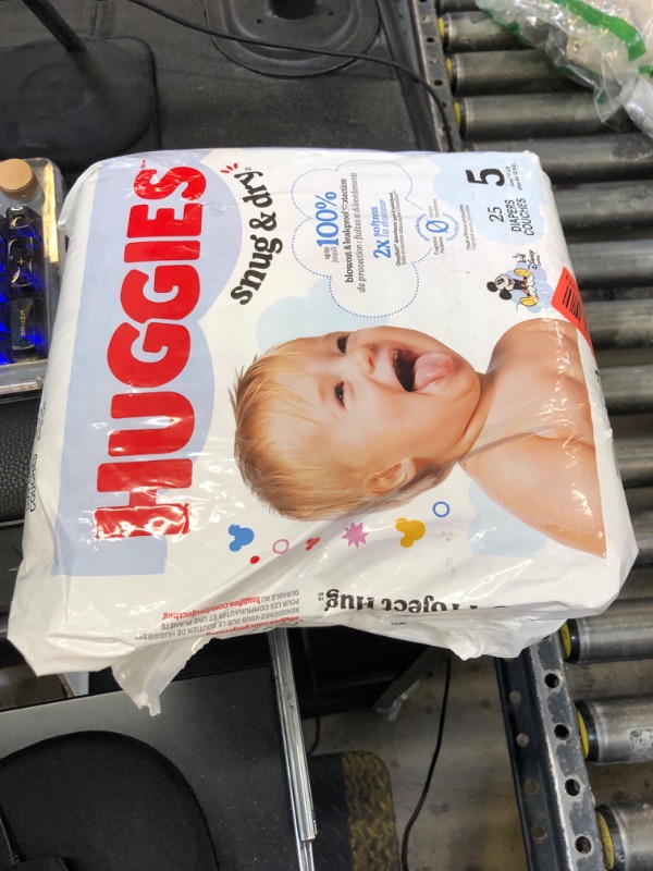 Photo 1 of Huggies Size 5 Diapers, Snug & Dry Baby Diapers, Size 5 (27+ lbs), 25 Count, Packaging May Vary