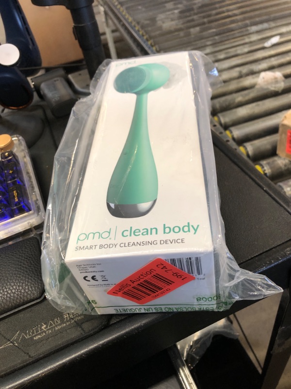 Photo 1 of PMD Beauty Clean Body - Smart Body Cleansing Device with Silicone Brush & Three Interchangeable Attachments - Waterproof - SonicGlow Vibration - Cleanse,Exfoliate,& Massage Body