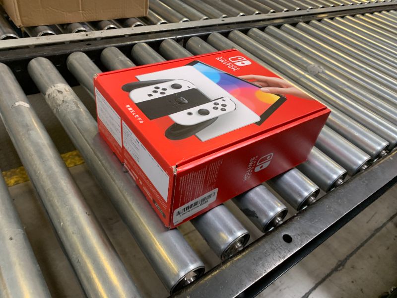 Photo 1 of Nintendo Switch (OLED model) with White Joy-Con