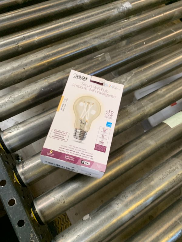 Photo 1 of Feit Electric A1960CL/927CA/FIL/AG 60 Watt Equivalent WiFi Dimmable, No Hub Required, Alexa or Google Assistant, Filament A19 LED Smart Light Bulb, 4" H x 2.25" D, 2700K Soft White