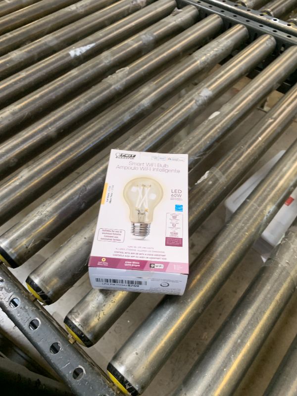 Photo 1 of Feit Electric A1960CL/927CA/FIL/AG 60 Watt Equivalent WiFi Dimmable, No Hub Required, Alexa or Google Assistant, Filament A19 LED Smart Light Bulb, 4" H x 2.25" D, 2700K Soft White