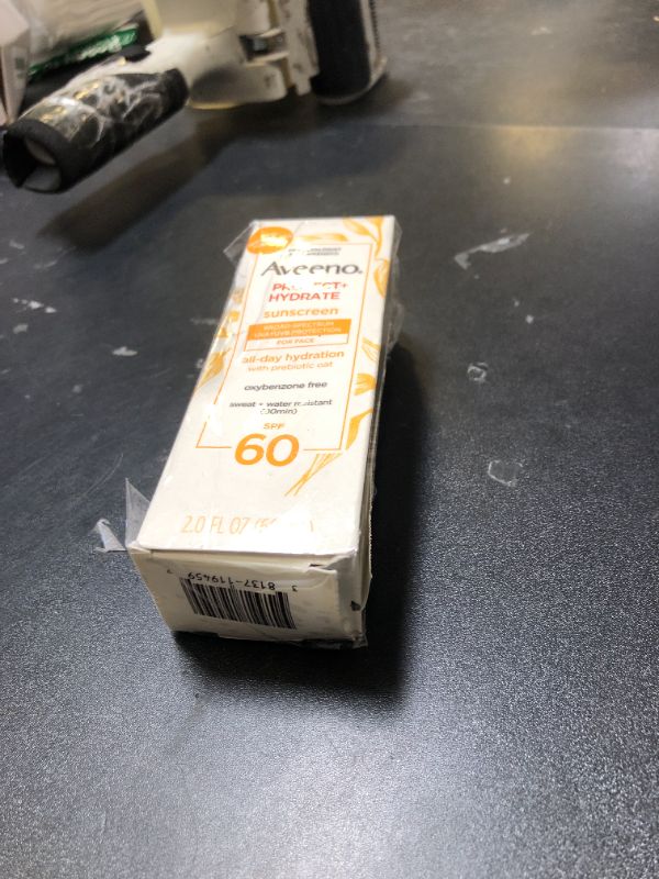 Photo 1 of Aveeno Protect + Hydrate Sunscreen Moisturizing Face Lotion with Broad Spectrum SPF 60 and Prebiotic Oat, Paraben, Phthalate, Oxybenzone and Oil Free Sunscreen for Sensitive Skin, 2.0 FL OZ EXP 01/27
