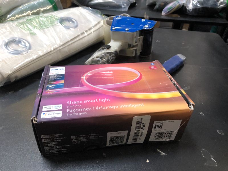 Photo 1 of Philips Hue Indoor 6-Foot Smart LED Light Strip Base Kit with Plug - Flowing Multicolor Effect - 1 Pack - Control with Hue App - Works with Alexa, Google Assistant and Apple HomeKit