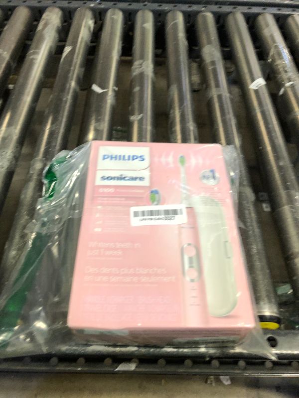 Photo 1 of Philips Sonicare ProtectiveClean 6100 Rechargeable Electric Toothbrush, with Pressure Sensor, 3 Cleaning Modes, SmarTimer and QuadPacer, 14-Day Battery Life, Travel Case, Pink, Model HX6876/21