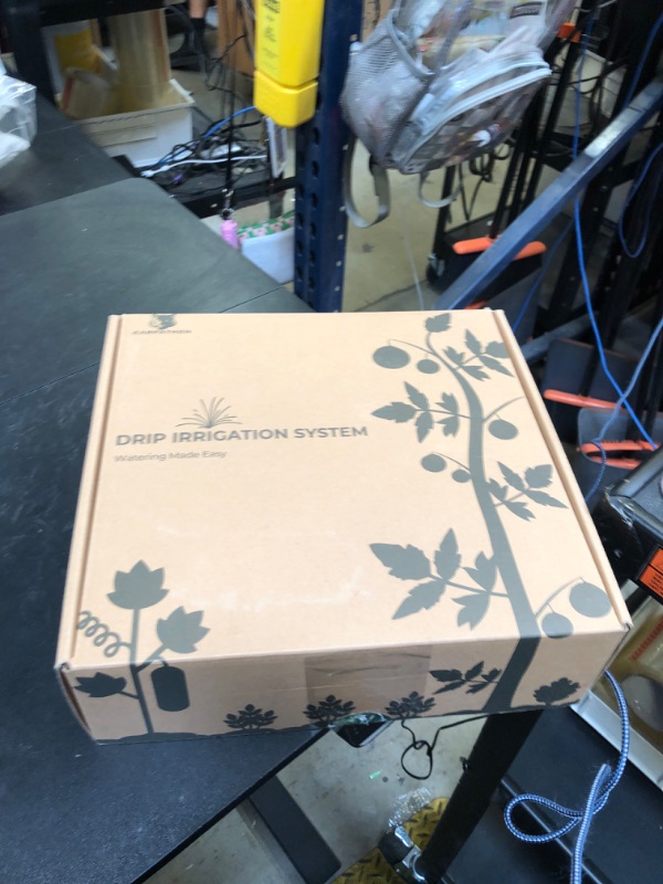 Photo 1 of CARPATHEN Drip Irrigation System - Adjustable Premium Irrigation System for Garden, Raised Beds - Complete Drip Irrigation Kit with Drip Emitters, 5/16" and 1/4" Irrigation Tubing and Barbed Fittings