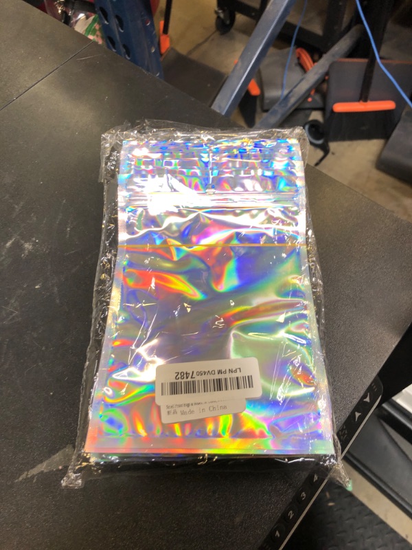 Photo 1 of Trunple Smell Proof Bags & Resealable Foil Pouch Mylar Sample Bag Great for Party Favor Food Storage (Holographic Color) (50Pcs-5.5x8 Inch)
