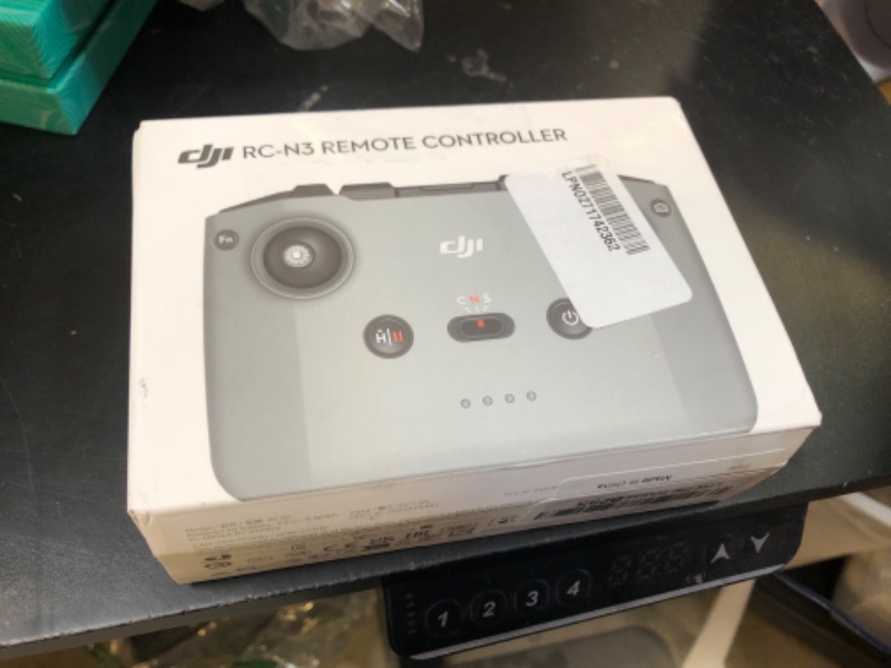 Photo 1 of Original RC-N3 Remote Controller for DJI Neo Mini 4 Pro Air 3 Air 3S Flip Up to 3.5 Hours of Battery Life with Mobile Device Holder