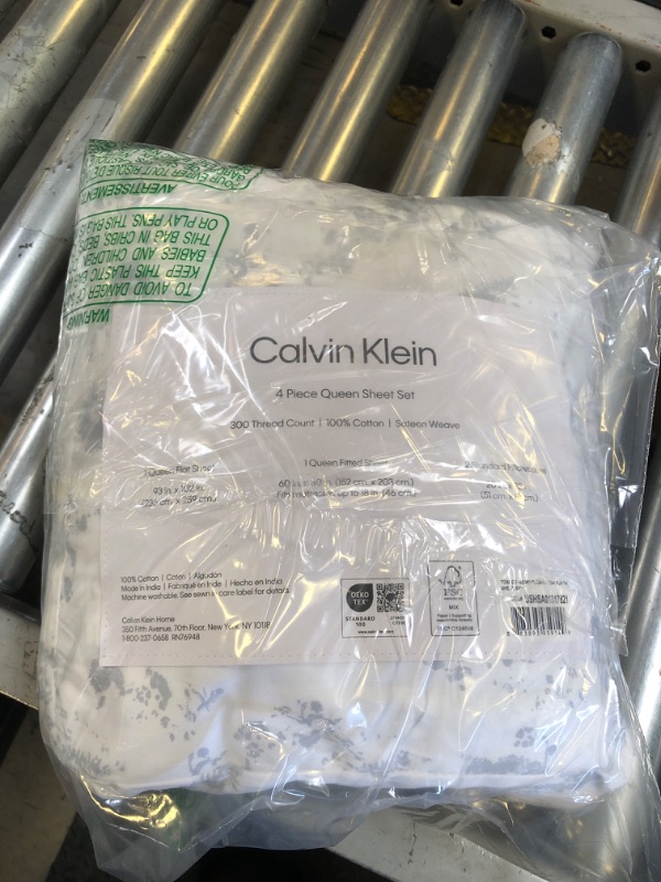 Photo 1 of Calvin Klein - Queen Bed Sheets, Silky Smooth Sateen Cotton Bedding Set with Deep Pockets, Oeko-TEX Certified (Tossed Micro Blue, Queen)