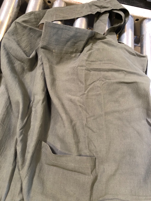 Photo 1 of dark green half Apron size small