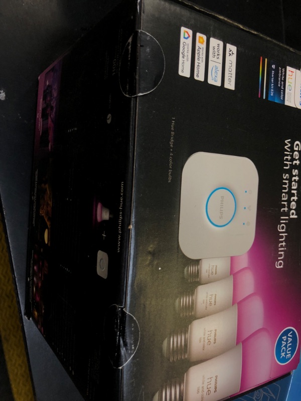 Photo 1 of Philips Hue Smart Light Starter Kit - Includes (1) Bridge and (4) 75W A19 E26 LED Smart White and Color Ambiance Bulbs - Control with App - Compatible with Alexa, Google Assistant, and Apple HomeKit