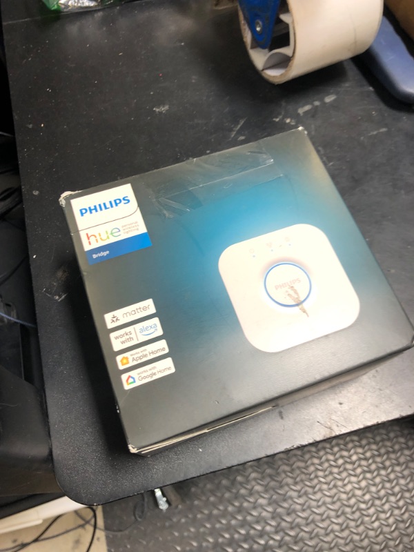 Photo 1 of Philips Hue Bridge - Unlock the Full Potential of Hue - Multi-Room and Out-of-Home Control - Create Automations and Zones - Secure, Stable Connection Won't Strain Your Wi-Fi - Works with Voice, Matter