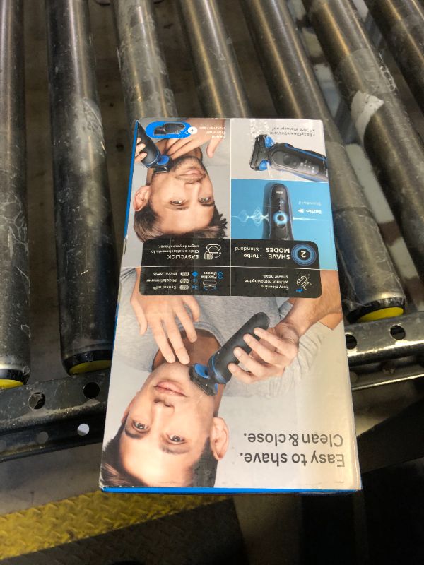 Photo 1 of Braun Electric Shaver for Men, Series 5 5120s, Wet & Dry Shave, Turbo Shaving Mode, Foil Shaver, Engineered in Germany, with Beard Trimmer & Attachments, Blue-